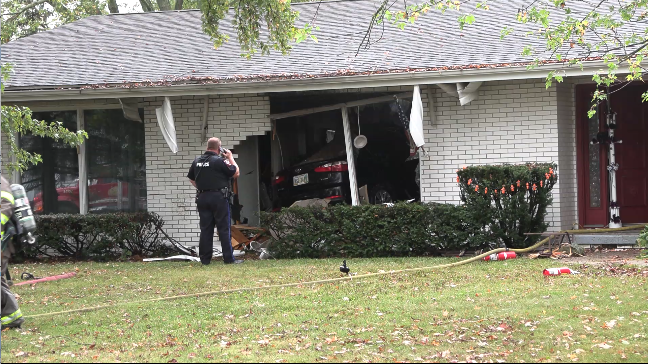 Car crashes into Spencerville home, causes minor fire